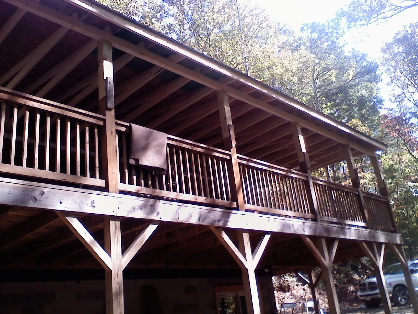 Timber framing under a new elevated porch and deck — Roof Leak Repair in La Motte by Roofing Brothers
